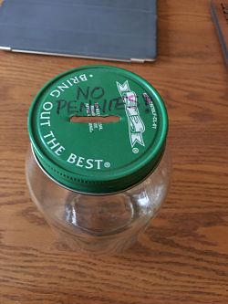Photo of Jar Lid with Hole cut in it.